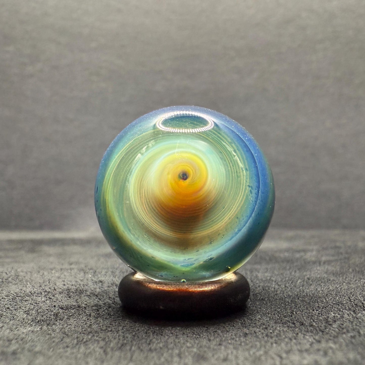 1.06 Inch Flip-Side Glass Marble – Silver Fume Spiral Art Glass – Handmade Collectible with Display Stand