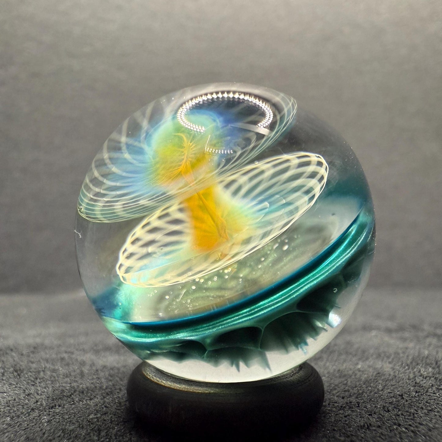 1.15 Inch Handcrafted Borosilicate Glass Marble with Neptunium Implosion & Fumicello- Heady Glass Art Marble - Includes Wooden Display Stand